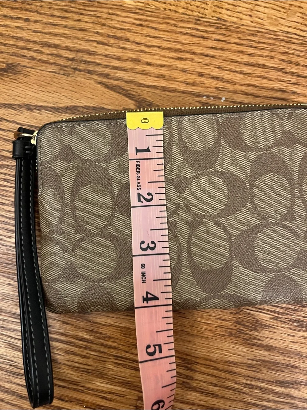 Coach Brown Monogram Wristlet with Black Stripe and Gold Hardware